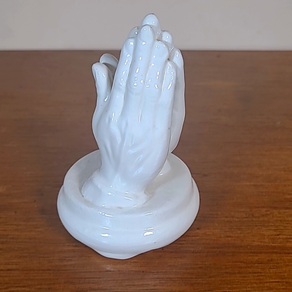 Vintage white glazed ceramic praying hands. Marked EH